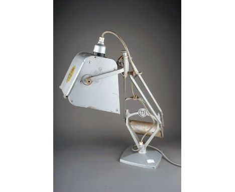 A Hadrill &amp; Horstmann 'Pluslite' counterbalanced desk lamp, metallic finish, lacks fold out lens from metal shade, approx