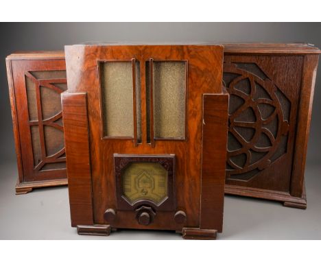 A Phillips Art Deco style valve radio Type 577A and two early 20th century oak cased speakers, the radio in a walnut veneered