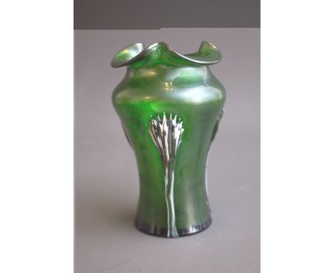 An early 20th Century iridescent green waisted vase with tri-form rim, applied with claw pattern with white and green lines, 