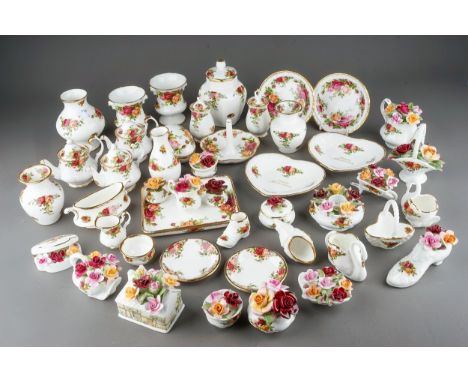 A collection of Royal Albert 'Old Country Roses' giftware, including posy ornaments, egg trinket , pin dishes, miniature tea 