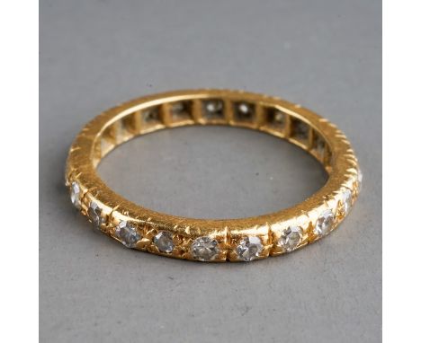 A yellow gold and diamond eternity ring, size K, unmarked, total gross weight approx 2.2g 