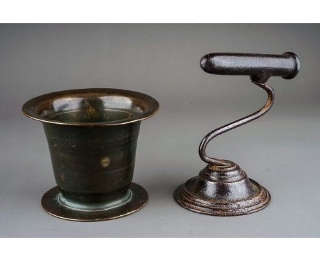 A late 18th century bronze mortar and a cast iron goffering iron stand, mortar height 9.5cm, stand height 14.5cm (2) 