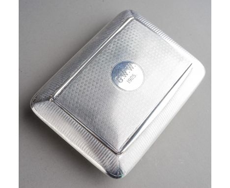 A George V silver cushion shaped tobacco box and cover, engine turned the cover with circular cartouche and engraved G.W.W 19
