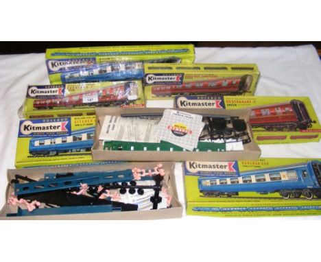 Six unopened boxes of Kitmaster scale model trains