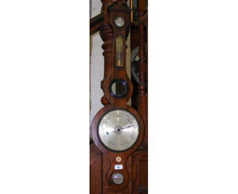 A rosewood cased wheel barometer/thermometer