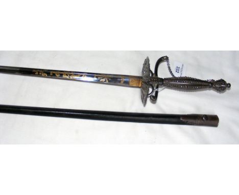 A cut steel hilted court sword with triangular tapering blade, the handle pommel and guard decorated with cut steel faceted s