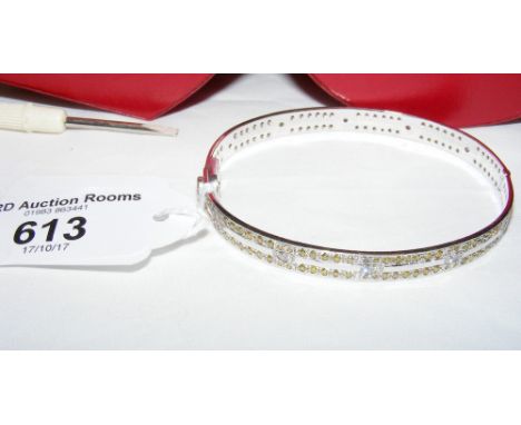 Multi-coloured diamond set bangle in 18ct white gold setting