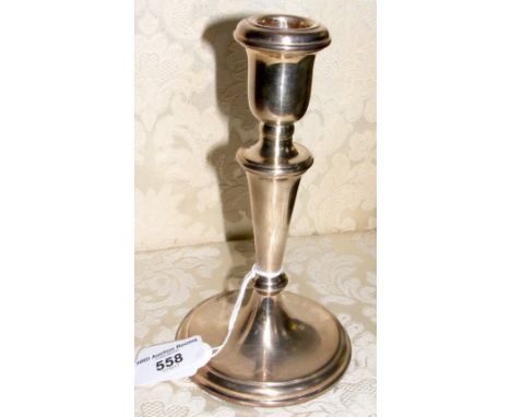 An 18cm high silver candlestick