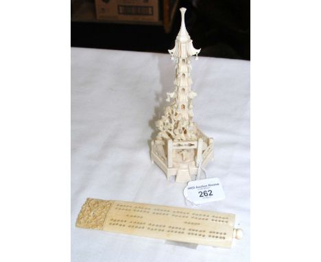 Oriental carved ivory cribbage board and an intricate pagoda