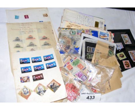 A box of Great Britain mint stamps, First Day Covers, early USA stamps, etc.