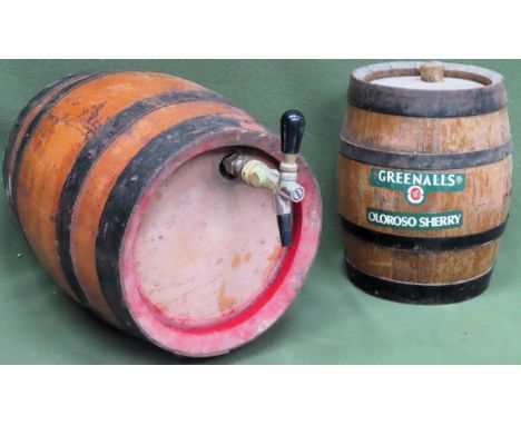 Two vintage Barrels, one with tap dispenser.
Both in used condition
