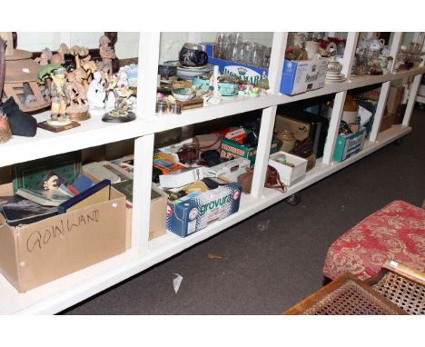Full shelf of collectables including cameras and accessories, Bush radio, stone bottle, books, cutlery, etc