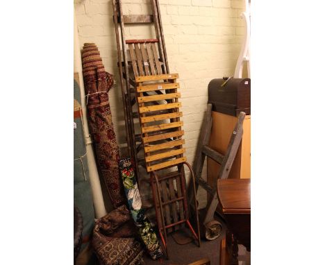 Vintage sack barrow, pair steps, Singer sewing machine, two sledges, three rugs and wall hanging (9)