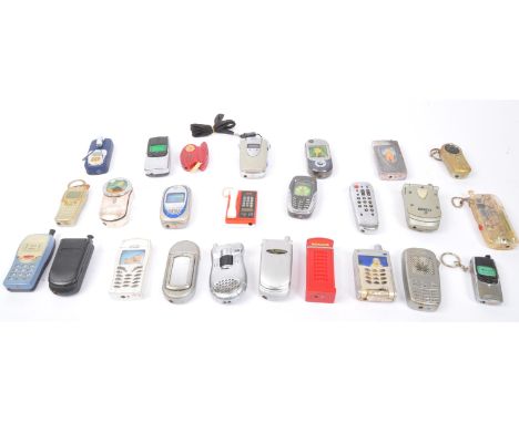 A collection of vintage 20th century Novelty cellphone themed cigarette pocket lighters to include various shapes &amp; model