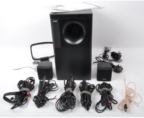 A Bose Acoustimass 3 Series IV Speaker system comprising of subwoofer speaker and pair of mini table speakers. Complete with 