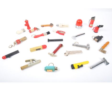 An assortment of vintage 20th century Novelty tools themed cigarette pocket lighters. The lot to include fire extinguishers, 