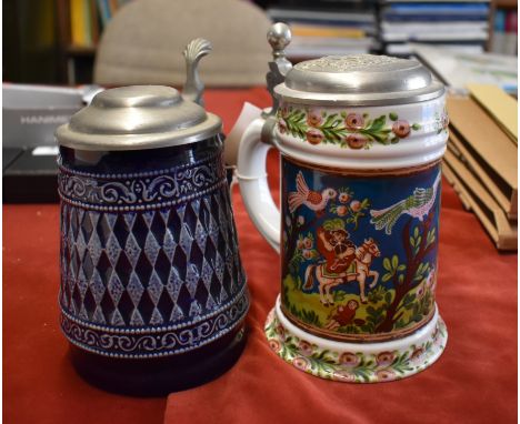 Steins (3) - Ceramic steins, dark blue with white pattern, floral design on white back ground, picture of men on horse back, 