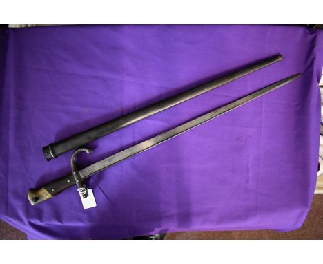 French Mod 1874 Gras Rifle Bayonet, engraved on the spine ‘Mre D’Armes, St Etienne 1878.' Bayonet and scabbard have matching 