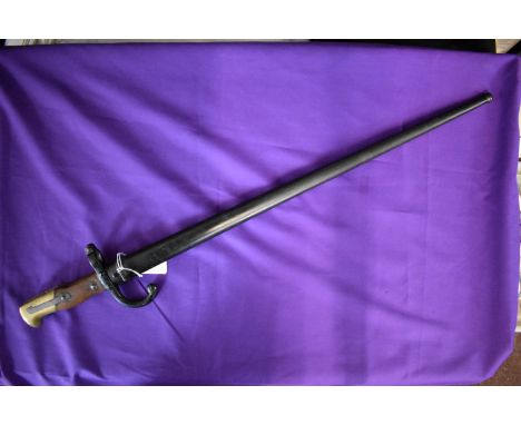 French Mod 1874 Gras Rifle Bayonet, engraved on the spine ‘Mre D’Armes de Tulle, Octobre 1881'. Bayonet and scabbard don't ma