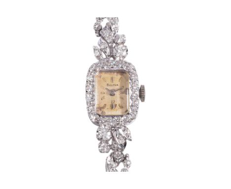 A DIAMOND WATCH BY BULOVA
Circa 1960s, featuring round brilliant and round single cut diamonds totalling approximately 1.80 C