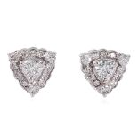 A PAIR OF TRIANGULAR SHAPED DIAMOND STUD EARRINGS