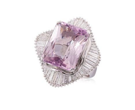 A LARGE KUNZITE AND DIAMOND RING
Featuring a radiant cut kunzite weighing approximately 30.0 Cts, mounted in a platinum setti