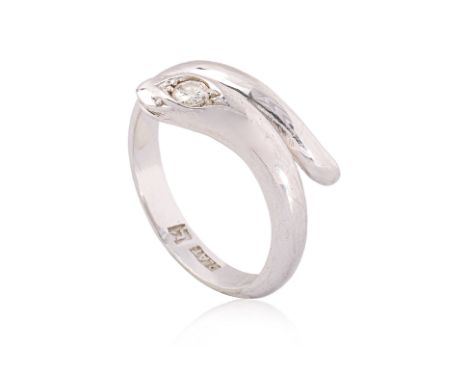 A DIAMOND 'SERPENT' PLATINUM RING
Featuring a round brilliant cut diamond weighing approximately 0.08 Cts, mounted in a plati