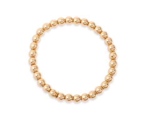 AN ITALIAN GOLD BEADS BANGLE
Featuring round gold beads on a stretchable bracelet marked '750' for 18K, additional mark for A