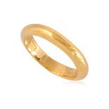 A HIGH KARAT GOLD WEDDING BAND