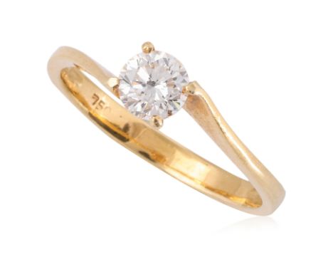 A DIAMOND SOLITAIRE CROSSOVER RING
Featuring a round brilliant cut diamond weighing approximately 0.50 Cts, mounted in a yell