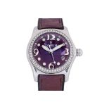 A CORUM LADY'S 'BUBBLE' STAINLESS STEEL AND DIAMOND WATCH