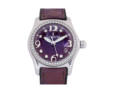 A CORUM LADY'S 'BUBBLE' STAINLESS STEEL AND DIAMOND WATCH
Ref.39.151.47,
Stainless steel case with diamond set bezel, purple 