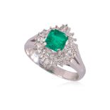 A COLOMBIAN EMERALD AND DIAMOND RING