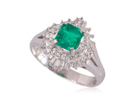 A COLOMBIAN EMERALD AND DIAMOND RING
Featuring an emerald cut Colombian emerald weighing approximately 0.78 Cts (marked), mou