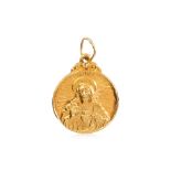 A HIGH KARAT GOLD 'JESUS CHRIST' PENDANT