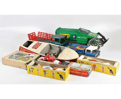 A collection of vintage toys and games including Playcraft construction kit, Tri-ang Fort, Pelham puppets, Tonka recycling tr