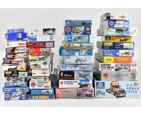 A collection of model kits including Revell Supermarine Spitfire Mk V, Airfix Mitsubishi A6M2 Zero, Heller Gloster Gladiator,