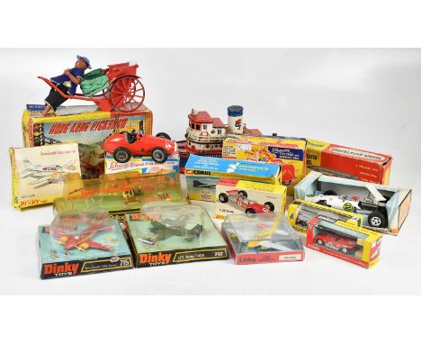 A collection of vintage vehicle models, including Marx tinplate ferry, Solido Ferrari 312 PB, Budgie Rolls-Royce Silver Cloud