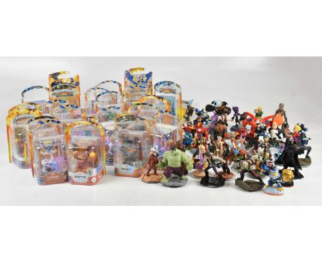 A collection of Skylanders and Disney Infinity video game figures, loose and boxed, including Marvel, Pixar, Disney, Star War