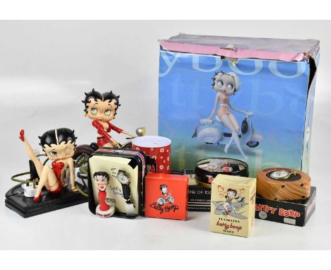 A collection of Betty Boop memorabilia, including ceramic figure seated on a scooter, pocket watch, wristwatches, desk lamp, 