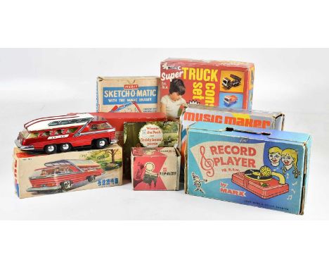 A collection of vintage toys including Merit Sketch-o-Matic, Merit film projector, Music Maker record player, Constructo Supe