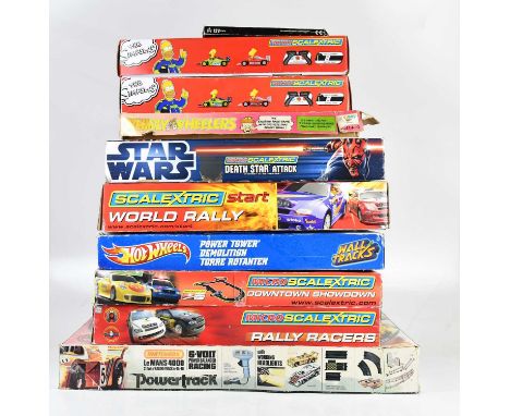 A collection of electronic racing games by Matchbox, Palitoys and Scalextric including The Simpsons, Hot Wheels Power Tower D