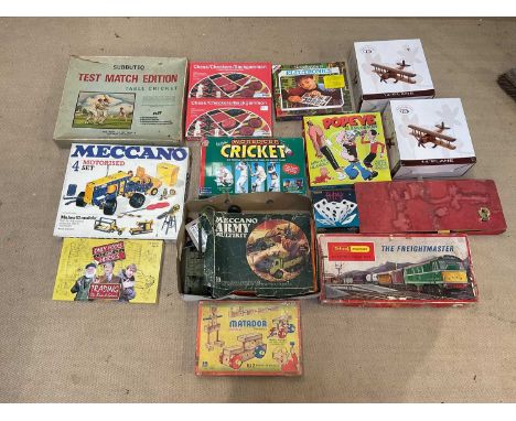 A collection of table top board games, construction kits and train sets, including Hornby Freight aster set, Meccano motorise