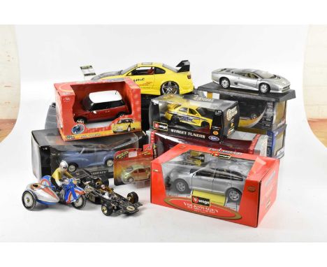 A collection of tinplate, die-cast and model vehicles including Minichamps, Maisto, Burago, etc. 