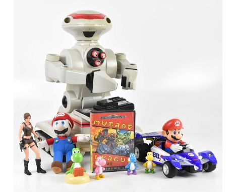 A collection of video game related memorabilia, including Lara Croft figure, Mutant League Football for the Sega Mega Drive, 