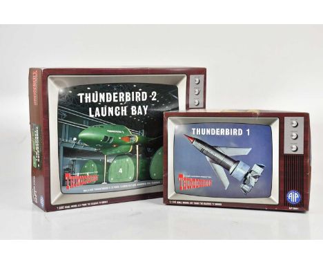 THUNDERBIRDS; two Bachmann Aoshima Thunderbirds model kits, comprising Thunderbird 1, complete in box, and Thunderbird 2 laun