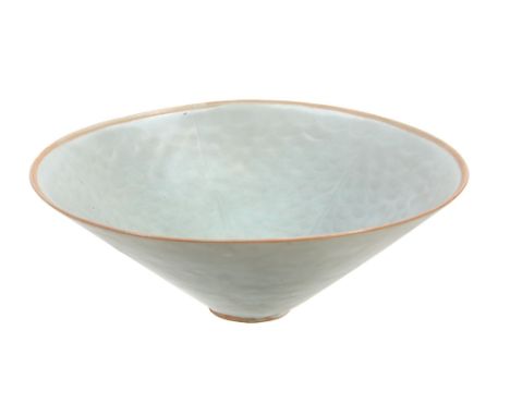  A Qingbai carved conical bowl, Southern Song dynasty  , thinly potted, with white, flaring sides, the interior decorated wit