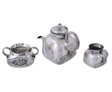  An Export silver rounded square three piece tea service by Tu Mao Xing,   Jiujiang, Jiangxi Province, circa 1880-1930, hamme