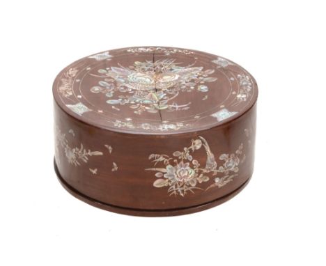  A wood box, 19th century  , of circular shape, delicately inlaid, on the lid and sides, with mother of pearl designs of bloo