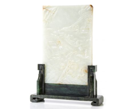  A white jade table screen, 19th century  , the upright rectangular panel finely carved in relief on one side with two schola